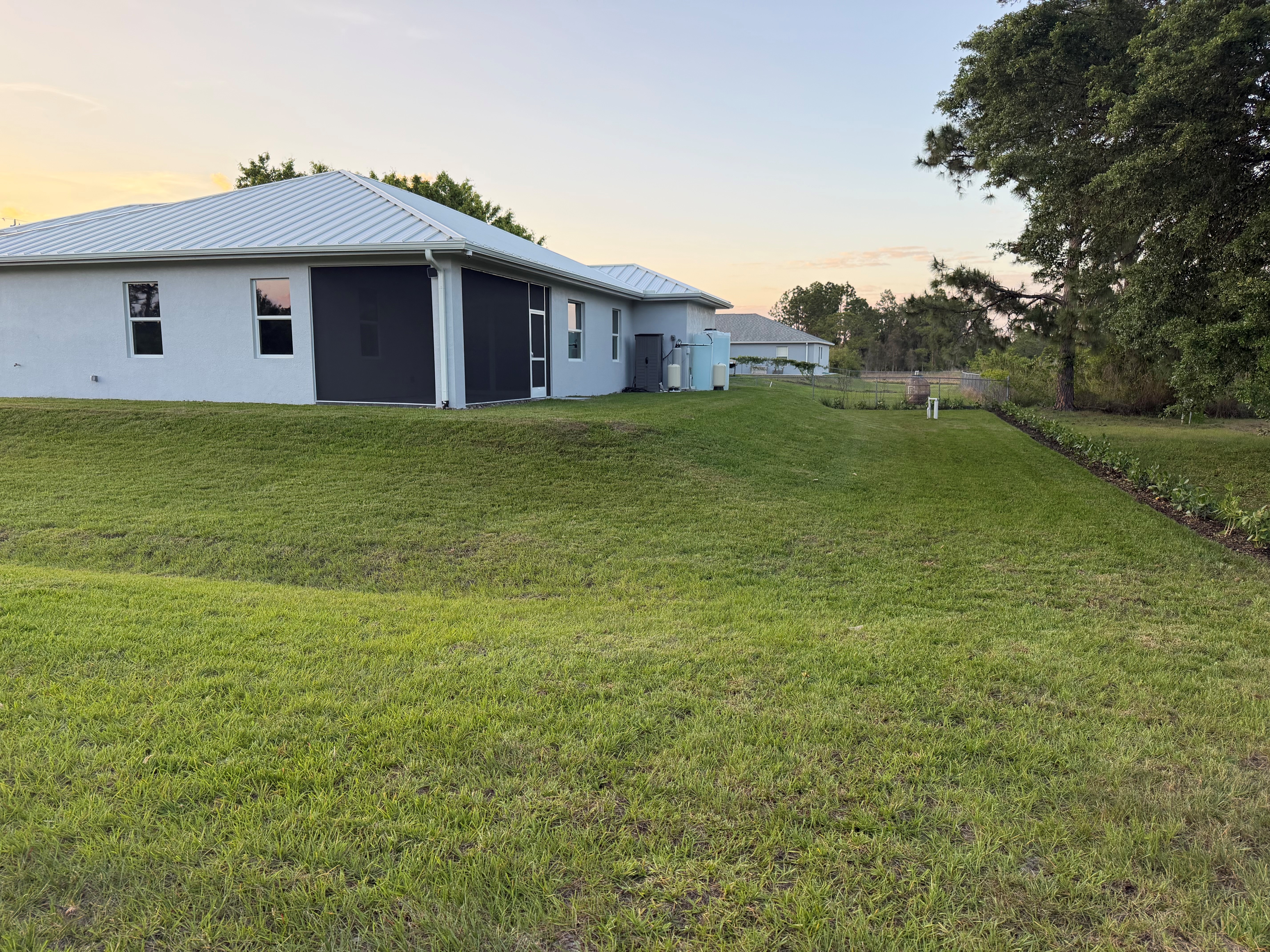 Freshly mowed lawn with clean stripes - RCW lawn transformation